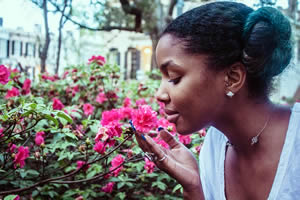 smelling flowers