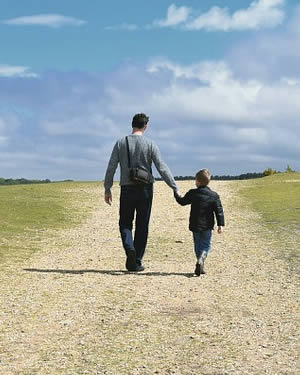 Child And Dad Walking